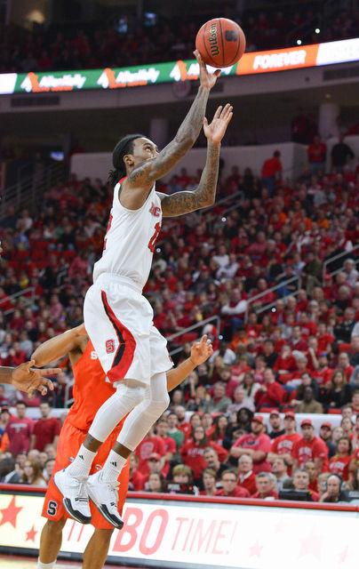 The N.C. State men's basketball team defeated the Syracuse Orange Saturday, March 7, 2015 at PNC Arena 71-57. With the win against the Orange the Wolfpack clenched a number 7 seed in the ACC tournament.