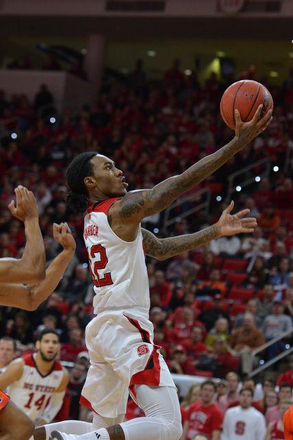 The N.C. State men's basketball team defeated the Syracuse Orange Saturday, March 7, 2015 at PNC Arena 71-57. With the win against the Orange the Wolfpack clenched a number 7 seed in the ACC tournament.