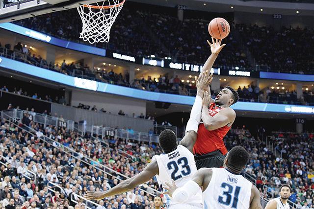 Freshman forward Abdul-Malik Abu shoots the ball during the third round game of the NCAA tournament against Villanova at the Consol Energy Center in Pittsburgh, PA. Abu had 13 points and 12 rebounds in 31 minutes during the Wolfpack's 71-68 victory over the 1-seed Wildcats.