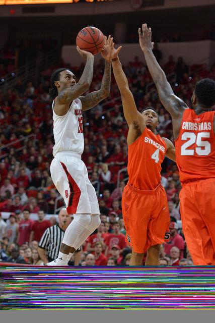 The N.C. State men's basketball team defeated the Syracuse Orange Saturday, March 7, 2015 at PNC Arena 71-57. With the win against the Orange the Wolfpack clenched a number 7 seed in the ACC tournament.