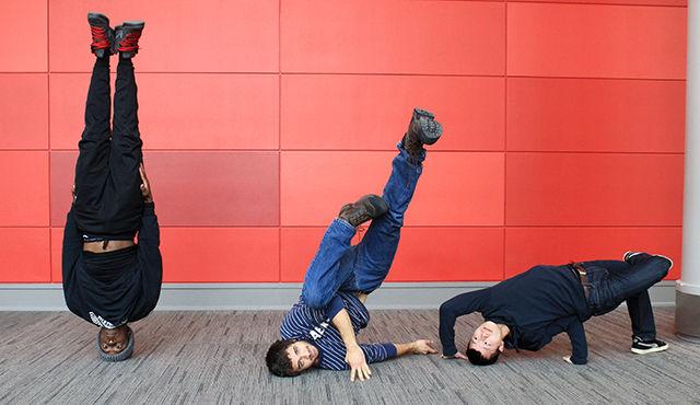 Peter Vu, a senior studying chemical engineering, Alex Olosu, a sophomore studying textile technology, and Samuel Jacobs, a junior studying mechanical engineering, show off some of their dance moves in Talley Student Union on Tuesday. &#8220;Breakdancing really takes what hip-hop means, this peace, love, unity, and just having fun to the greatest extent,&#8221; Vu said.