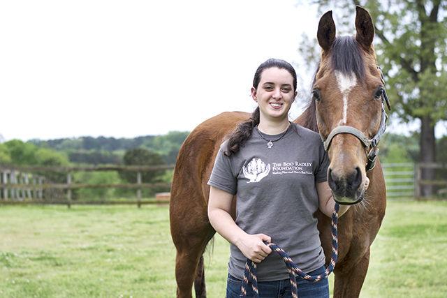 Catie McVey, a senior studying animal science and statistics, is one of two NC State students who were selected as recipients of the 2015 Barry M. Goldwater Scholarship. McVey spent the summer of 2014 in Edinburgh, Scotland researching swine behavior. Upon gradation, she wishes to pursue a PhD in applied animal behavior. "I do it for the pigs," she said.