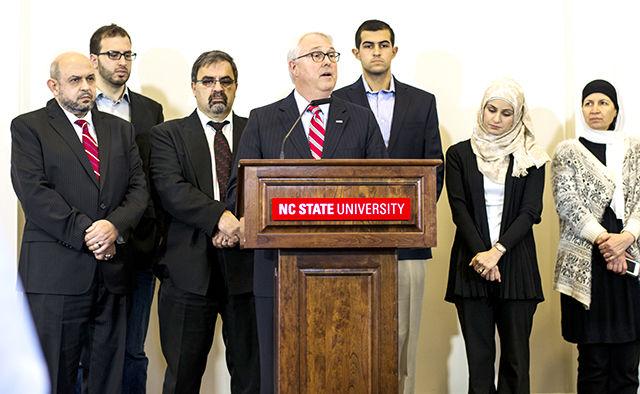 Surrounded by the family members of slain students Deah Barakat, Yusor Mohammad Abu-Salha, and Razan Mohammad Abu-Salha, Chancellor Randy Woodson announces the University's establishment of the "Our Three Winners" scholarship endowment fund Friday morning, Feb. 20, 2015 at the Roy H. Park Alumni Center. The endowment will provide annual financial support to NC State students studying in the Poole College of Management, College of Sciences, and College of Design.