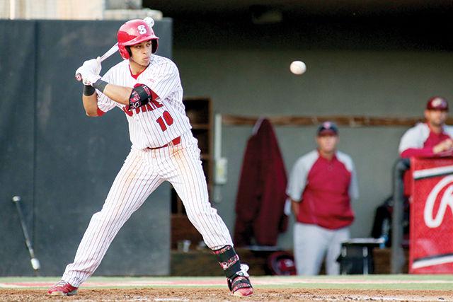 Freshman infielder Joe Dunand keeps an eye on the ball during the game against Elon. Dunand had two hits, two runs and five runners batted in during an impressive 14-0 thumping of the Eagles on Doak field, March 24th.