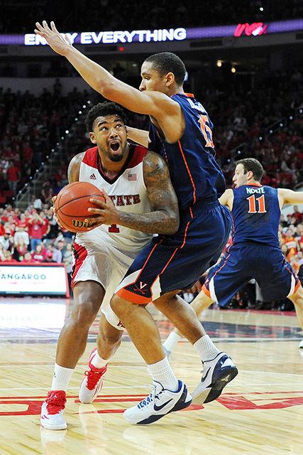 Redshirt junior guard Trevor Lacey drives for a layup during the game against Virginia Feb. 11. Lacey had 14 points in the Wolfpack's 51-47 loss to the Cavaliers at PNC Arena.