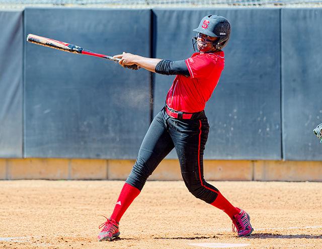 Tyler Ross swings at a pitch in a game for Pack. Ross is hitting .305 with nine home runs and 38 RBIs.