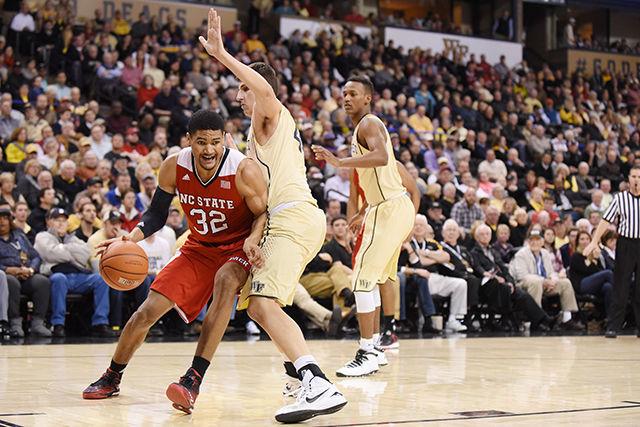 Sophomore forward Kyle Washington drives to the basket during the men's basketball game at Wake Forest Feb. 3. The Demon Deacons dominated the Wolfpack in the first half, leading 51-30 at halftime. The Wolfpack mounted an unsuccessful comeback attempt, finishing the game with an 88-84 loss. The loss brings the Wolfpack to 14-10 overall and 5-6 in the ACC.