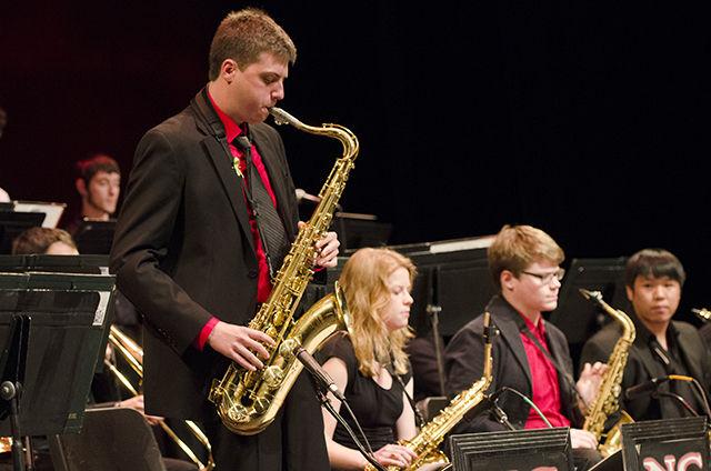 Graham Briggs, lead tenor in Jazz Ensemble II and a senior in electrical engineering, leads a solo at the jazz concert Tuesday in Titmus Theatre. Students prepare all semester in the jazz studies course taught by Wes Parker, director of Jazz Studies. The concert featured music by "Dizzy" Gillespie, Hank Mobley and studio lab combos.