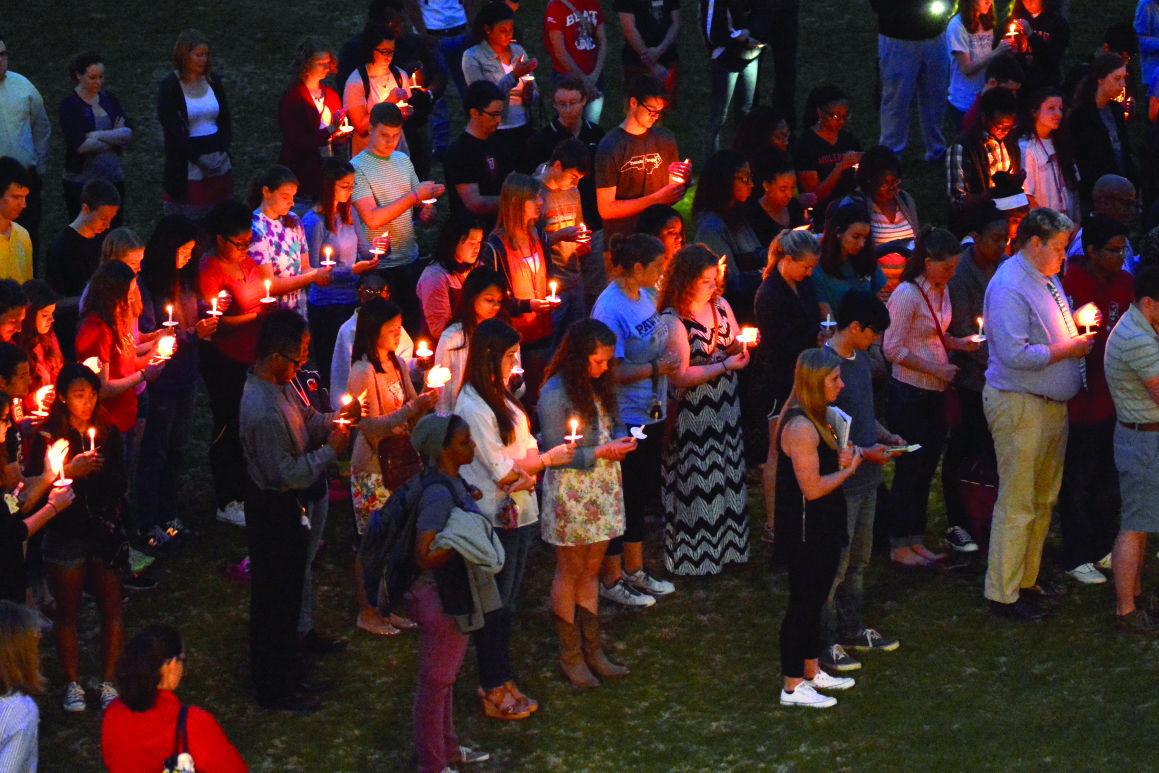 Members of the wolfpack hold a moment of silence and cherish the memories of Olivia Spurlock at the candellight vigil held in harris field on Monday evening. Friends and aquaintances of Olivia shared fond memories of her at the vigil and encouraged people to reach out to those in need. Olivia was a sophomore in mechanical engineering and one of the RA's of Sullivan.