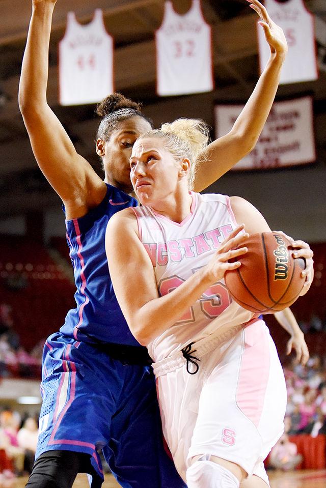 Junior forward/center Carlee Schuhmacher prepares to shoot the ball during the Hoops 4 Hope game against No. 10 Duke in Reynolds Coliseum Sunday, Feb. 22, 2015. The Wolfpack upset the Blue Devils, 72-59. More than $25,000 was raised to support the Kay Yow Cancer Fund.