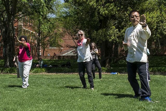Xiaozhong Tang, an associate professor of English from Nanjing Normal University visiting through the Confucius Institute, teaches a Tai Chi class Tuesday at the Court of North Carolina.