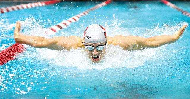 Junior Christian McCurdy rips down the lane during the 200-yard butterfly at NC State's meet with rival UNC-Chapel Hill Jan. 31 at the Casey Aquatic Center. McCurdy finished first in the event with a time of 1:44.68. The No. 8 Wolfpack men's team remained undefeated, beating the No. 20 Tar Heels 180-118. The No. 12 women's team just barely missed topping the No.5 Tar Heel women 146.5-134.5.