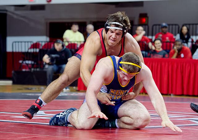 Redshirt junior Nick Gwiazdowski (285) takes down No. 30&#160; Mimmo Lytle of Kent State Jan. 24 in Reynolds Coliseum. Gwiazdowski earned a pin in his match, leading the Wolfpack to a 26-13 victory over the Golden Eagles.