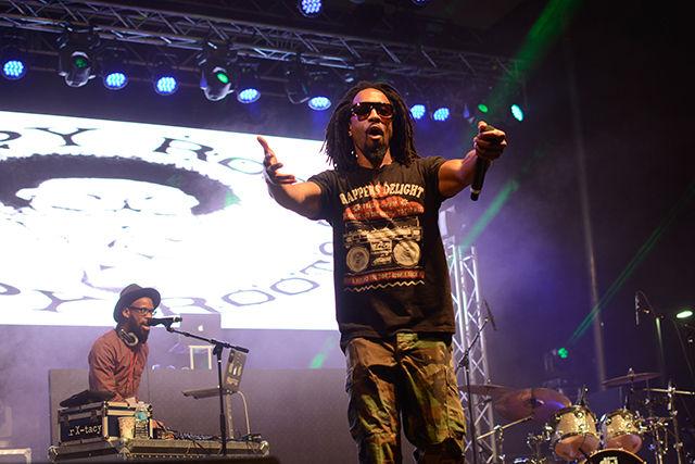 A member of Nappy Roots performs on the main stage.