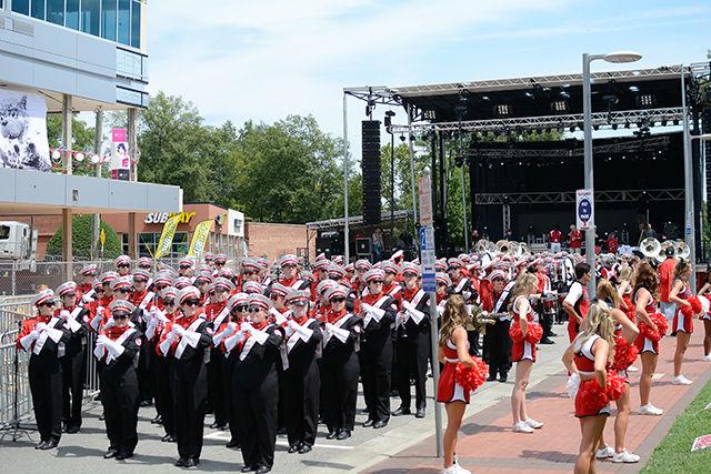 The NC State University marching band plays on Hillsborough Street for Packapalooza