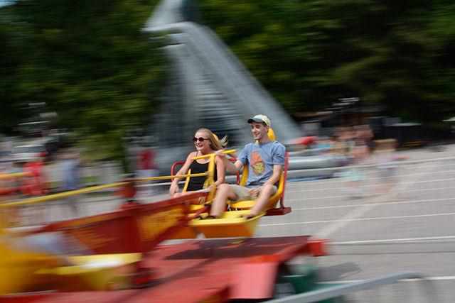 Jenny Green, a junior studying Business Administration, and Murray Farrington, a junior studying Economics, take a spin on the Wizzer ride.
