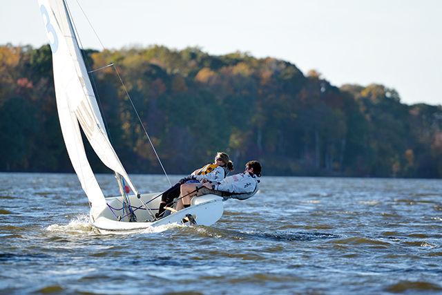 Paulina Spencer, a junior in Mathematics and Andrew Edwards, a sophomore in Chemical Engineering hikes down an FJ(Flying Junior) at Lake Wheeler on Friday. The NC State Sailing Club held their last practice session of the season on November 7. The team is looking forward to meet next in January.
