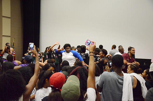 Participants rushed onto the stage to dance at the end of the Back to School Jam. The event took place Wednesday, August 19, 2015 in the Witherspoon Cinema.