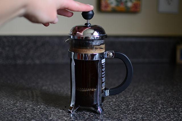 Finally, press down on the plunger and pour immediately. Add any desired condiments and enjoy your fresh French press coffee!