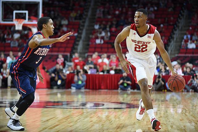 Redshirt senior guard Ralston Turner moves the ball down the court during the game against Richmond in PNC Arena Wednesday, Nov. 26, 2014. Turner was the Wolfpack's second-best scorer with 23 points in the 84-72 victory over the Spiders.