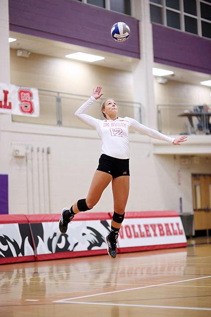 Freshman outside hitter Sarah Konchan goes up for a serve during the annual Wolfpack Challenge intrasquad scrimmage at the Broughton High School gym. The Red Team won the game 3-1 on August 23rd.
