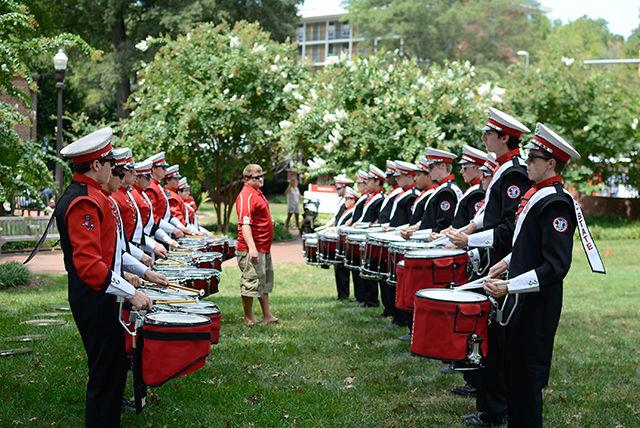 The NC State University drumline warms up before Packapalooza.