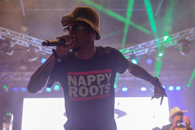 A member of Nappy Roots performs on the main stage.