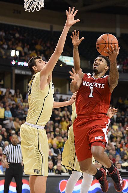 Redshirt junior guard Trevor Lacey shoots the ballduring the men's basketball game at Wake Forest Tuesday, Feb. 3, 2015. The Demon Deacons dominated the Wolfpack in the first half, leading 51-30 at halftime. The Wolfpack mounted an unsuccessful comeback attempt, finishing the game with an 88-84 loss. The loss brings the Wolfpack to 14-10 overall and 5-6 in the ACC.