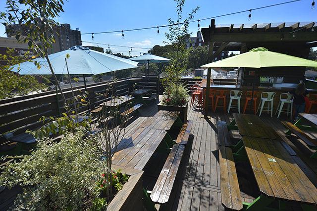 The roof deck of the recently opened Raleigh Beer Garden at 614 Glenwood Ave. The RBG offers 344 craft beers, 144 of which are locally brewed in North Carolina.