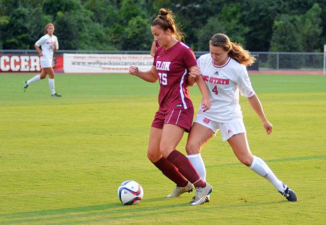 Freshman defender Hannah Keogh fights for posesion against the Elon Eagles defender. Wolfpack won the game 2-0 at Dail soccer stadium on August 27, 2015.
