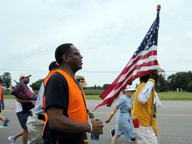 Reverend Curtis Gatewood marches on the Journey for Justice on Sunday. "The more you win, the more you have to maintain," Gatewood said.&#160;