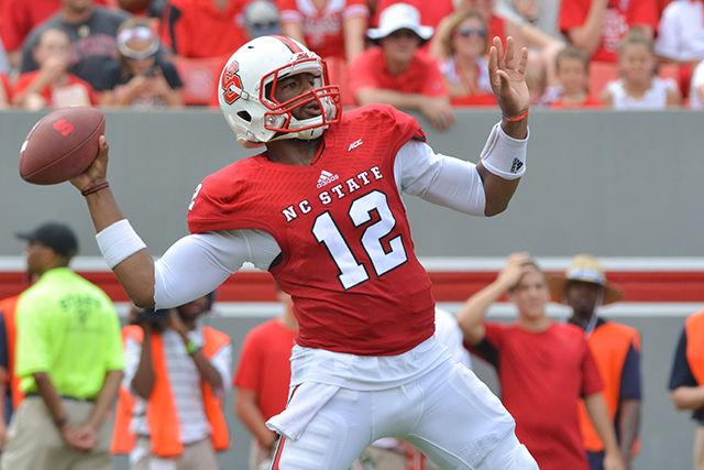 Redshirt junior quarterback Jacoby Brissett throws a pass during the game against Georgia Southern in Carter-Finley Stadium Saturday, Aug. 30, 2014. The Wolfpack defeated the Eagles, 24-23. Photo by John Joyner.
