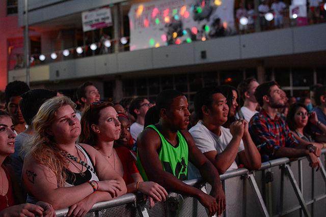The crowd eagerly awaits the start of the concert.