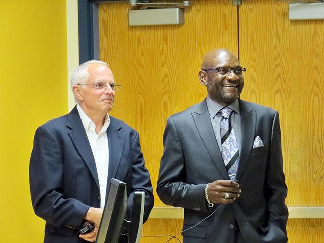Richard Rosen and Darryl Hunt smile while fielding audience questions after their presentation on Wednesday about Hunt's struggle to prove his innocence. Hunt was wrongly convicted in 1984 of the murder of 25-year-old Deborah Sykes, and while DNA testing proved his innocence in 1994, the appeal process took 10 years. The Innocence Project's message, Rosen said, "is not that there are angels out there waiting to be saved, it's that we don't know -- that this is an uncertain world." The event was part of the Park Scholarships Social Justice Series.&#160;