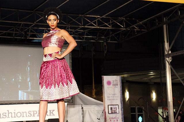 A model walks the ramp in dazzling design by featured designer Julkee Fashions at Fashion Spark on Saturday, September 19, 2015. Fashion Spark is a part of SparkCon, the annual street art festival of Raleigh.