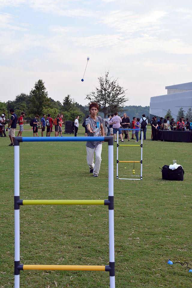 Shinya Tsuzuki, an exchange student from Nagoya University, Japan studying Material Engineering enjoys the game of Ladder Golf at Entrepalooza. Entrepalooza is an annual enrepreneurship and innovation festival hosted by the NC State Entrepreneurship Initiative. The event took place at The Oval Thursday on September 3, 2015.