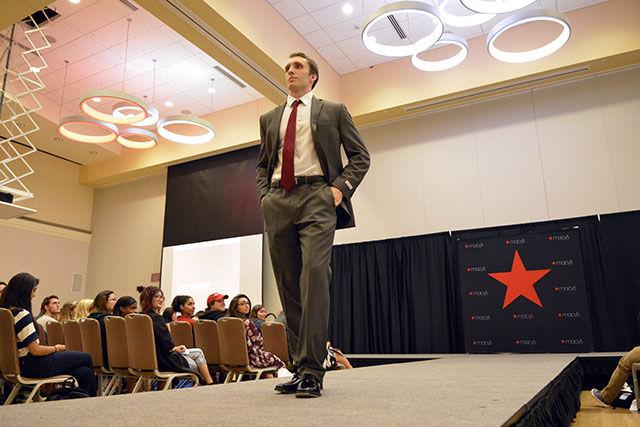Matt Pless, a senior studying Mechanical Engineering, models the perfect interview outfit for males. The Career Development Center held a Macy's Fashion Show in Talley Coastal Ballroom on Sept. 14th. Students had the opportunity to not only learn how to professionally dress, but to also win a new outfit from Macy's.