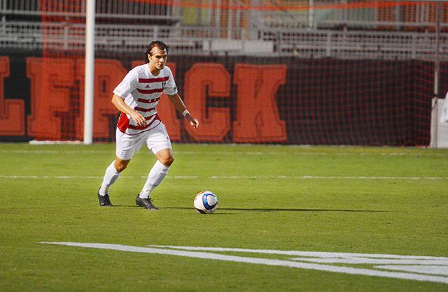 Senior Reed Norton a defender dribbles the ball. The NC State mens soccer team won 4-3 against Gardner Webb on September 22nd at Dail Soccer Stadium.