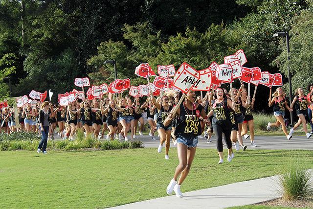 Members of Zeta Tau Alpha run across Stafford Lawn to congratulate their new sisters. Bid Day, the final event in sorority recruitment, took place on September 16th on Stafford Lawn.