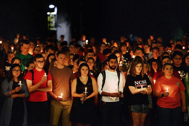People gather and listen to people speak at the Candlelit Vigil for Joseph Banks. About 1,300 people gathered on Stafford Commons on Tuesday, Sept. 15, 2015.