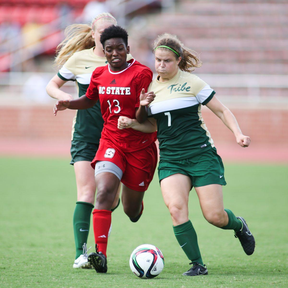 Freshman defender Ella Bonner fights to maintain possesion from the William and Mary defense. The Wolfpack lost against William and Mary 3-0 on September 6th in Dail Soccer Stadium making them 3-3-0 for the season.