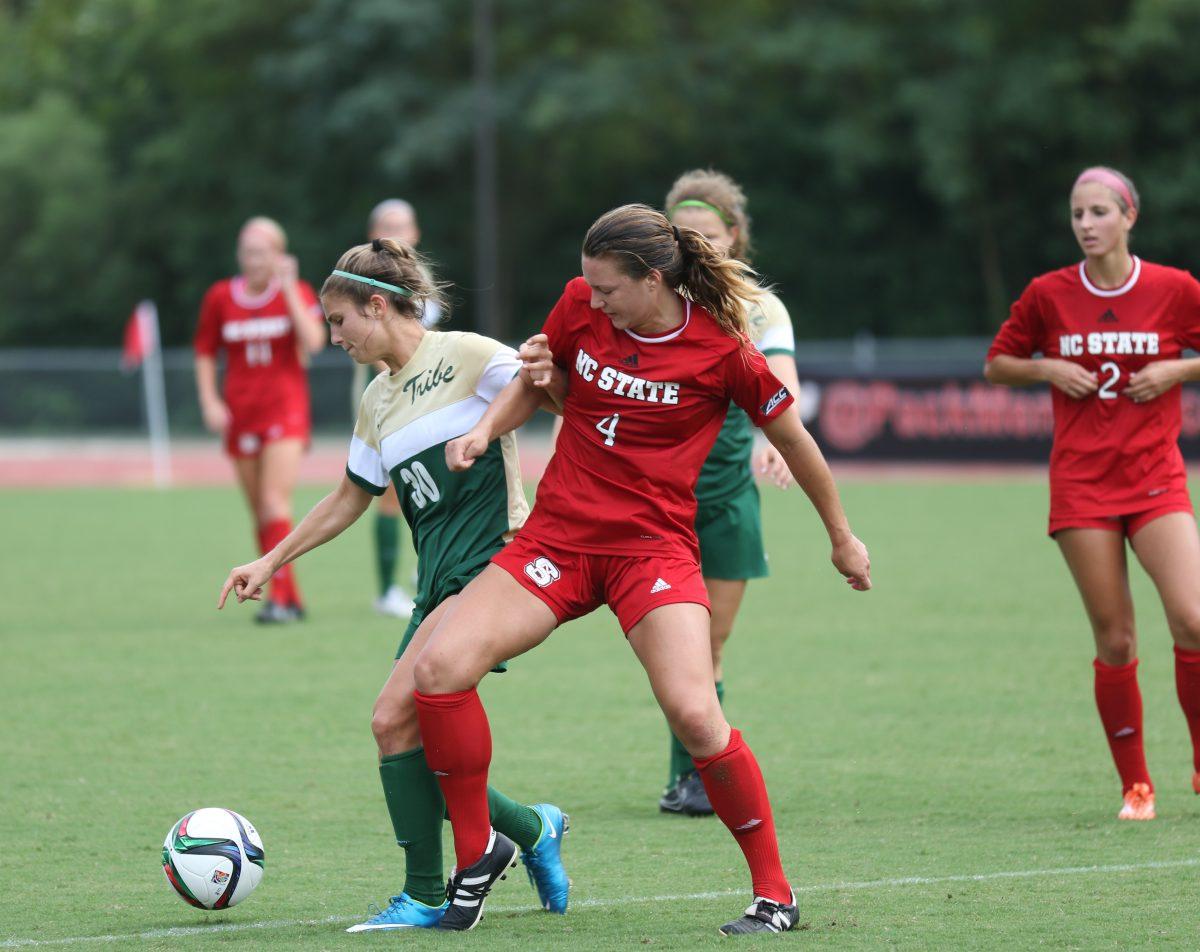 Freshman defender Hannah Keogh fights for possession of the ball against a William &amp; Mary defender at the game September 6. Keogh made one shot during the 0-3 loss to the tribe.
