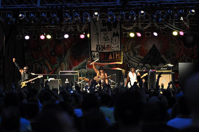The audience cheers as Death ends their performance. The concert took place in Raleigh City Plaza as a part of Hopscotch.