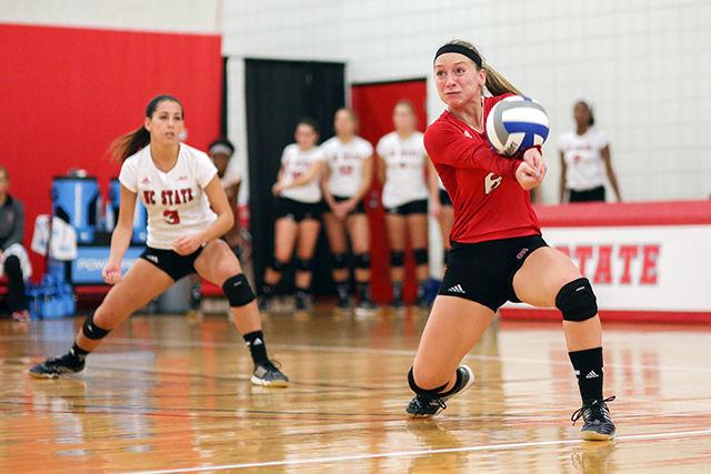 Freshman libero Kassie Kasper returns a serve against Jacksonville. The Wolfpack won against the Jacksonville Dolphins 3-1 making them 4-1 overall in the season.