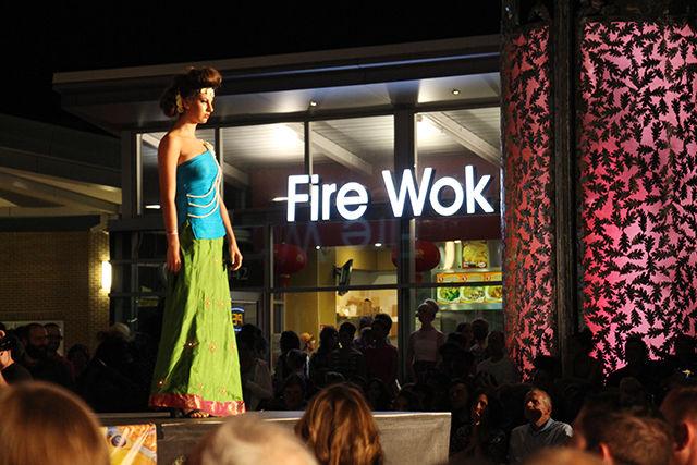 A model walks the ramp in traditional Indian colorful dress by featured designer Julkee Fashions at Fashion Spark on Saturday, September 19, 2015. Fashion Spark is a part of SparkCon, the annual street art festival of Raleigh.