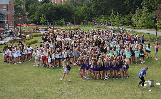 As the potential new members examine their shirts and discover which sorority they have admitted to, they rush to find the rest of their new sisters before meeting-up with their Bigs.
