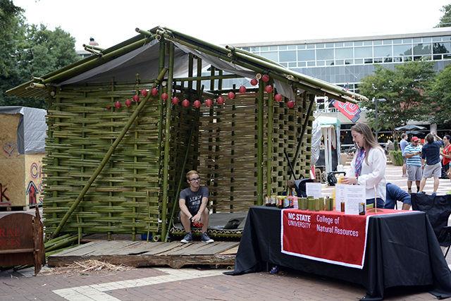 Andrea Sellers, a junior studying parks and recreation tourism management, and Ryan Levine, a freshman studying fishery and wildlife conservation biology, man the College of Natural Resources shack for Shack-A-Thon Sept. 22. The college built their shack out of bamboo taken from Hill Forest outside Durham and took them a total of 12 hours to build. Last year the College of Natural Resources won the award for best shack at Shack-A-Thon.