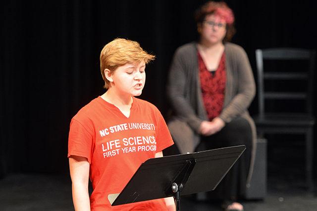 Parker Chase, a freshman in the Life Sciences First Year program, performs a piece at the 5th annual Red, White, and Banned on Sept 29 in the Titmus Theater from "Crank," a book by Ellen Hopkins that was number 4 on the Top Ten Most Challenged Books list from 2010. The event offers students a chance to perform exerpts from recently banned and challenged books, showcasing their talents in the theatre as well as giving other members of the NC State community the chance to learn more about why some books have been banned. Banned Books Week, which usually occurs during the last week of September, celebrates the freedom we have to access the information we want when we want, even if that information contains sensitive subjects like homosexuality, drugs, and violence.
