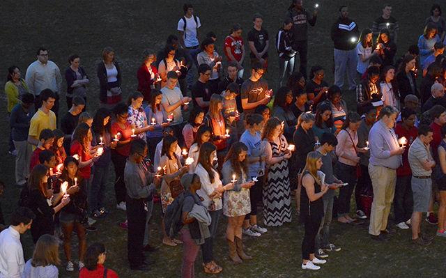 Members of the wolfpack hold a moment of silence and cherish the memories of Olivia Spurlock at the candle light vigil held in harris field on Monday evening. Friends and aquaintances of Olivia shared fond memories of her at the vigil and encouraged people to reach out to those in need. Olivia was a sophomore in mechanical engineering and one of the RA's of Sullivan.
