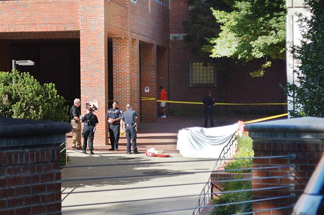 NC State police officers gather between Dabney Hall and Cox Hall to discuss an ongoing death investigation during the afternoon of September 14th.